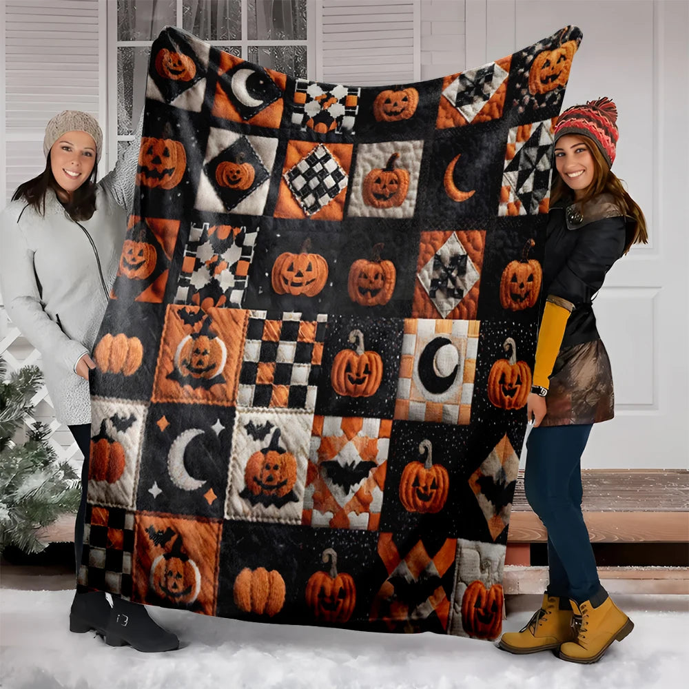 A woman models a vintage patchwork Halloween throw blanket featuring pumpkin and moon prints.