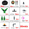 A collection of various components for a DIY drip irrigation kit including hoses, drippers, connectors, and taps.