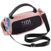 Pink shockproof silicone protective case for a JBL Charge 6 speaker with a black strap.