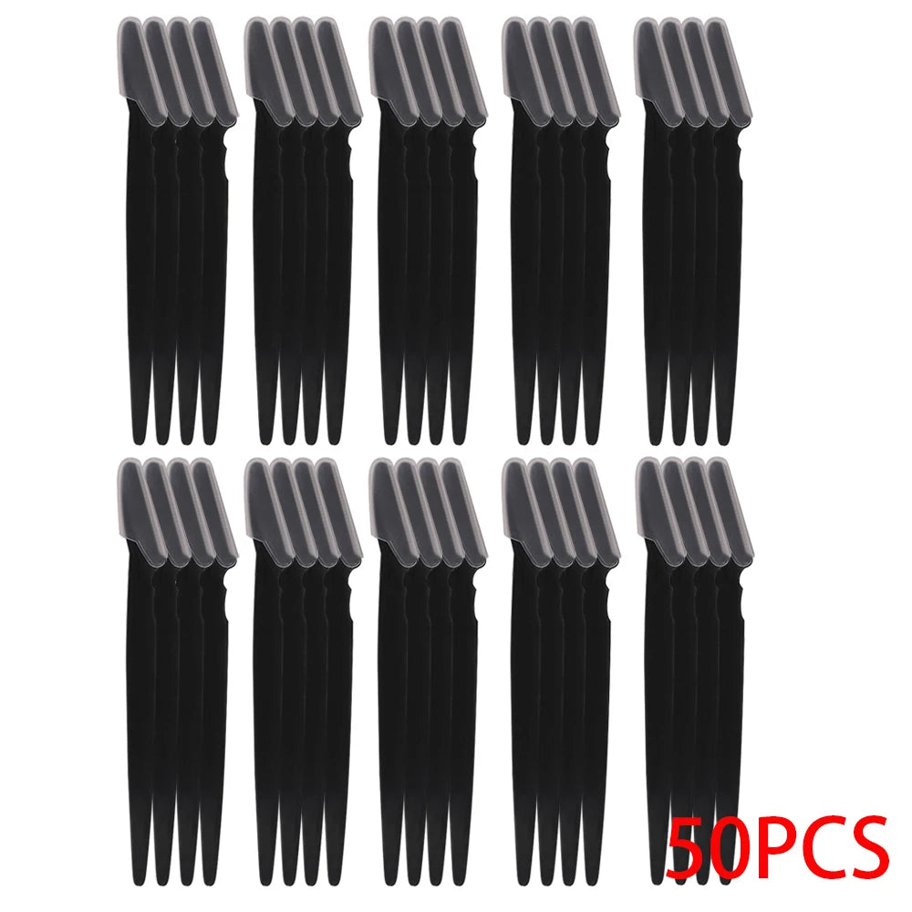 A set of black precision eyebrow razors for facial grooming and dermaplaning