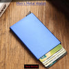 A blue men's metal wallet with a pop-up design showing several credit cards.