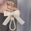 Elegant Pearl Bow Keychains for Bags and Accessories