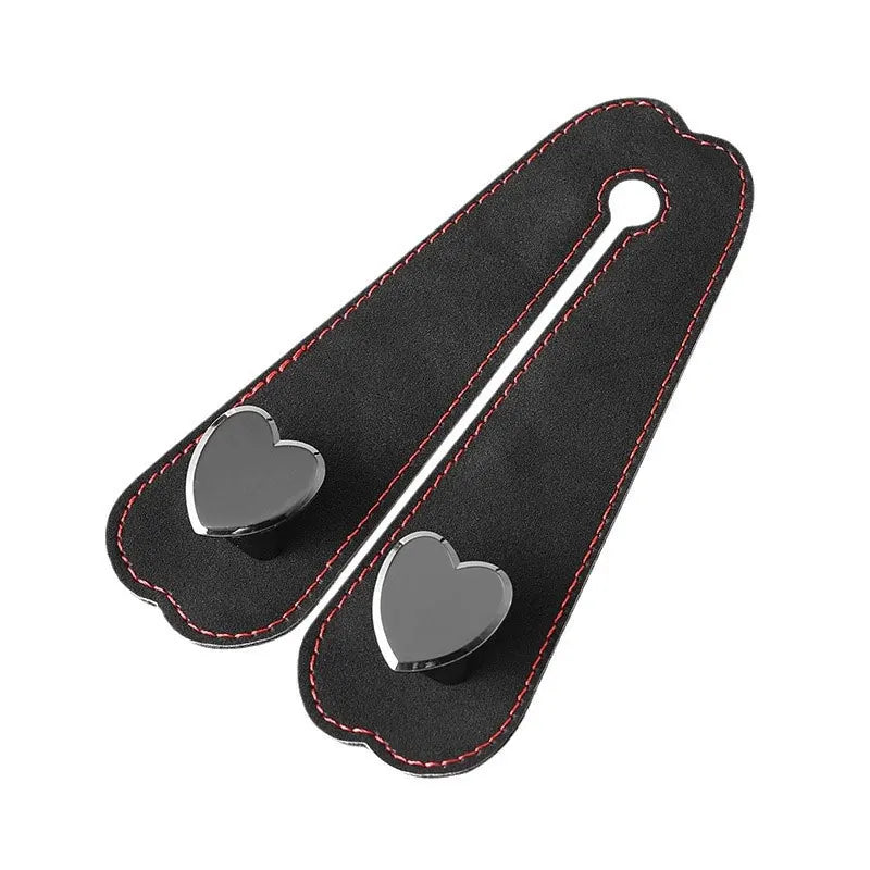 Black car seat headrest hook with dual metal hooks for securing bags and phones