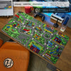 A large gaming mouse pad featuring a vintage city road design with buildings and roads.