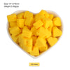 A pile of yellow silicone crown star heart beads for DIY jewelry making