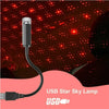 USB Star Sky Lamp featuring a cylindrical projection head and flexible cable on a pink background.