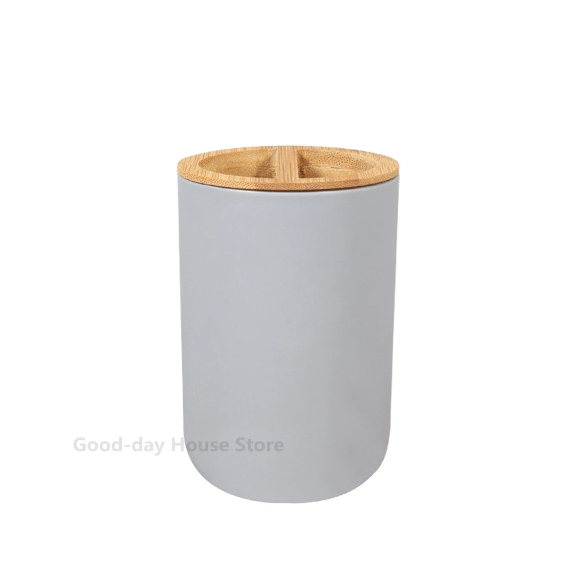 A cylindrical bathroom organizer set made of white ceramic with a wooden soap dispenser top.