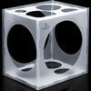 A clear plastic cube with multiple sizing holes marked 8 inch and 9 inch.