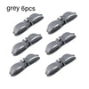 Six grey cord organizers or wire winders for tidy cable management.