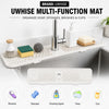 UWHISE multi-function mat organizing soap sponges brushes and cups in a kitchen sink