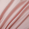 Soft pink luxury bamboo flat sheet draped elegantly