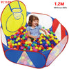 A yellow and blue foldable ball pit play tent with a storage basket filled with colorful plastic balls.