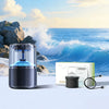 A black smart car diffuser with ambient light is shown next to its packaging and a power cord, set against a backdrop of ocea