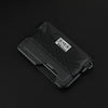 A black minimalist leather card holder with a bottle opener is shown from above.