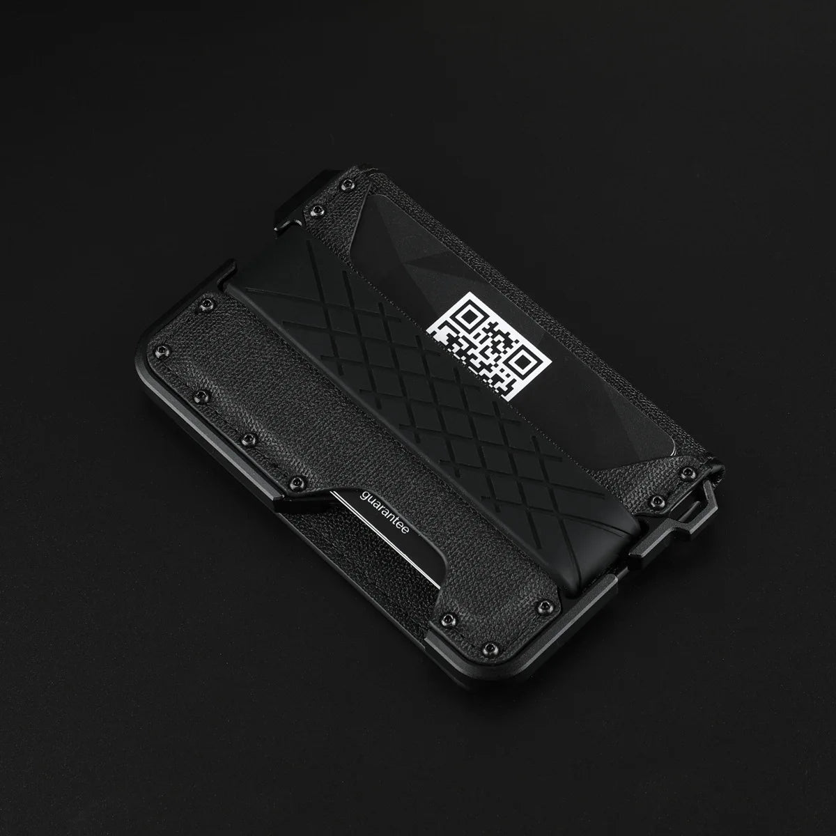 A black minimalist leather card holder with a bottle opener is shown from above.