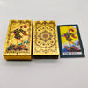 A deck of gold foil tarot cards and guidebook titled The Fool