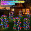 Solar powered willow tree fireworks lamp with flexible copper wire and large LED beads illuminating a garden.
