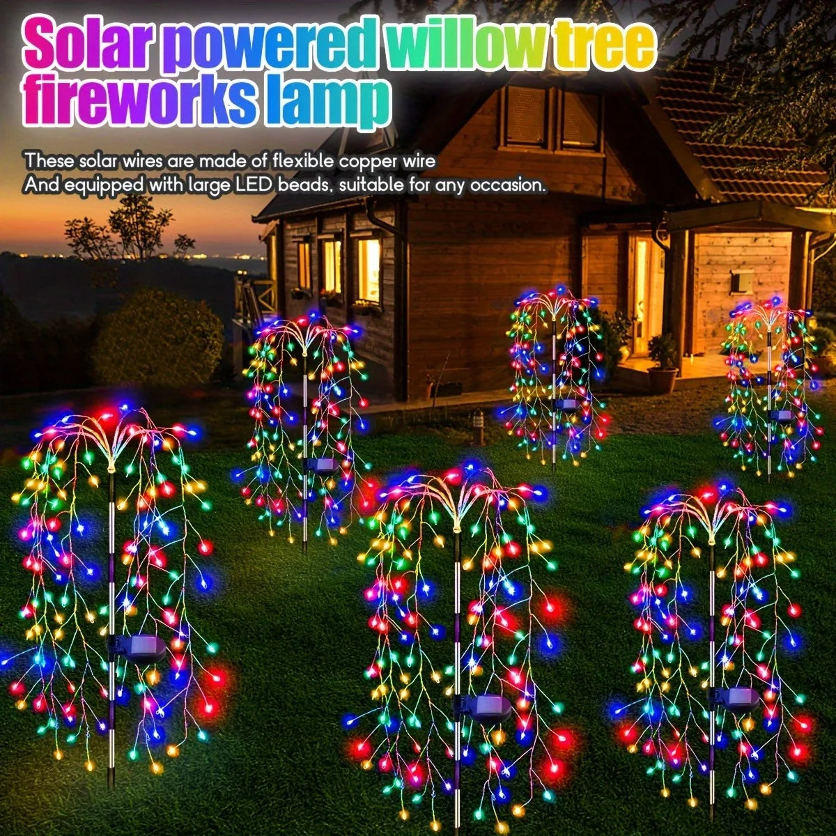 Solar powered willow tree fireworks lamp with flexible copper wire and large LED beads illuminating a garden.