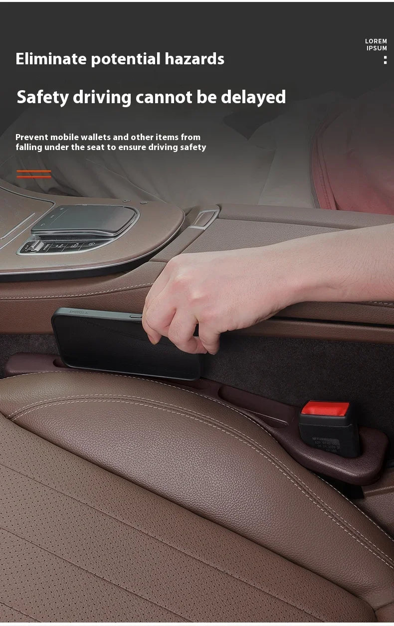 A hand is placing a smartphone into a gap plug strip designed to prevent items from falling between car seats.