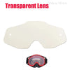 A transparent lens is shown alongside a pair of red and black motorcycle goggles.