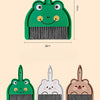 A set of three compact cartoon brooms and dustpans in green, pink, and brown for tabletop cleaning.