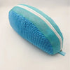 A teal and white fabric bag for a shoe washing machine with a soft bristled cleaning brush set.
