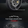 Close-up of a motorcycle wheel assembly showing detailed performance components and smooth lines.