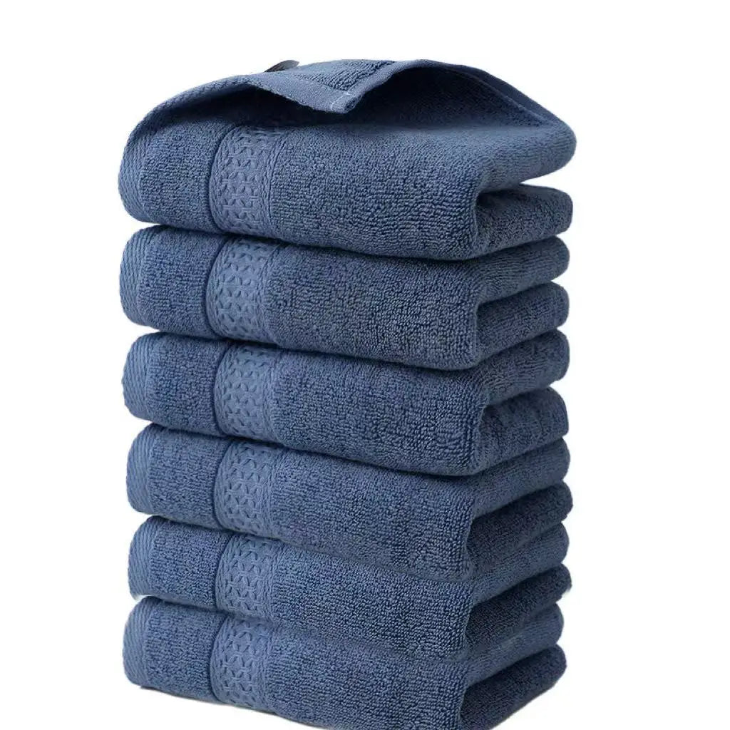 A stack of six dark blue microfiber face towels