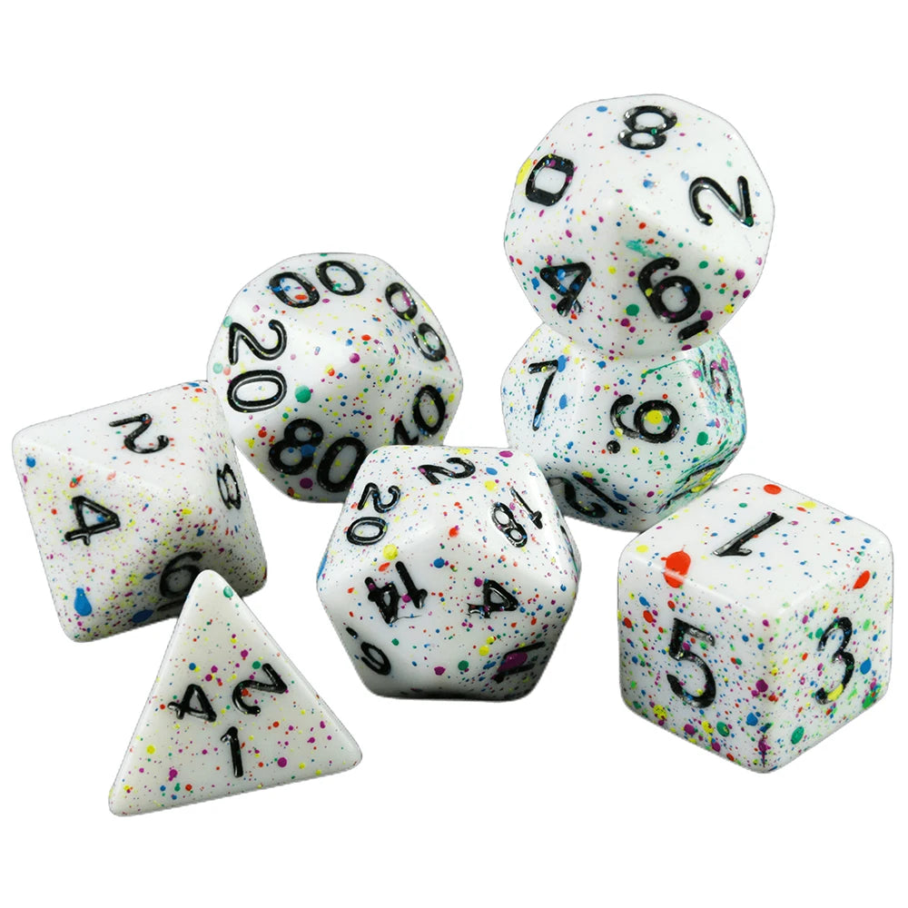 A set of seven polyhedral dice including a d8, d10, d12, d20, and three d6 dice scattered on a white surface.