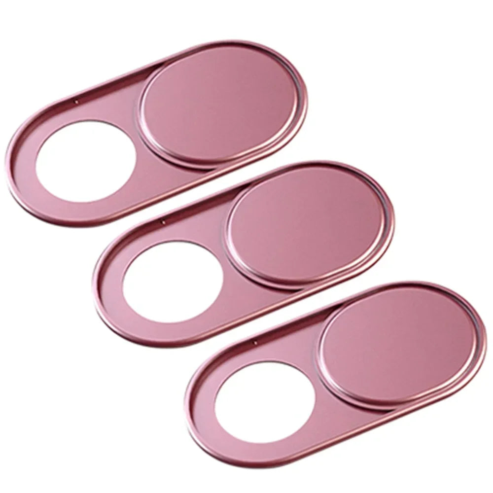 Three pink magnetic webcam covers for laptops, tablets, and phones