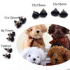 A collection of black safety noses with various sizes and washers for stuffed animals and DIY crafts.