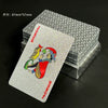 A stack of silver playing cards with a Joker card visible, measuring 87mm by 57mm.