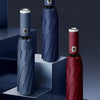 Three-fold automatic flashlight series featuring blue, red, and black umbrellas displayed on tiered stands.