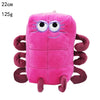 A pink, elongated plush toy resembling a caterpillar with large blue eyes and purple markings.