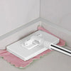 A white 360° rotating hands-free flat mop with a reusable cloth resting on a pink towel.