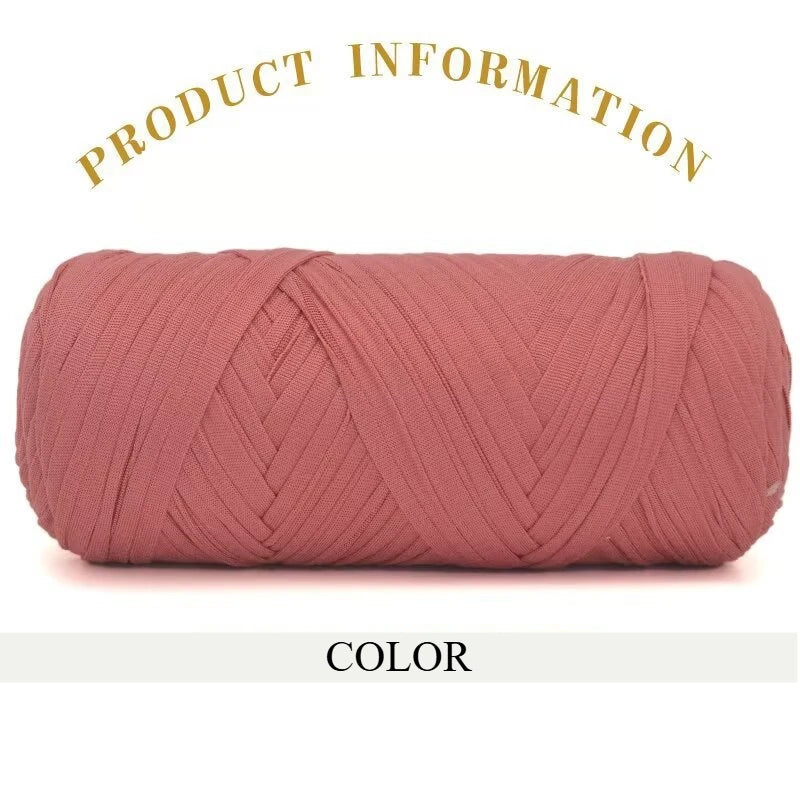 A skein of thick, pink-colored polyester blend yarn coiled for knitting and crochet.
