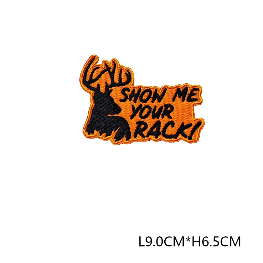Orange embroidered hunting patch featuring a silhouette of a deer head and the text Show Me Your Rack