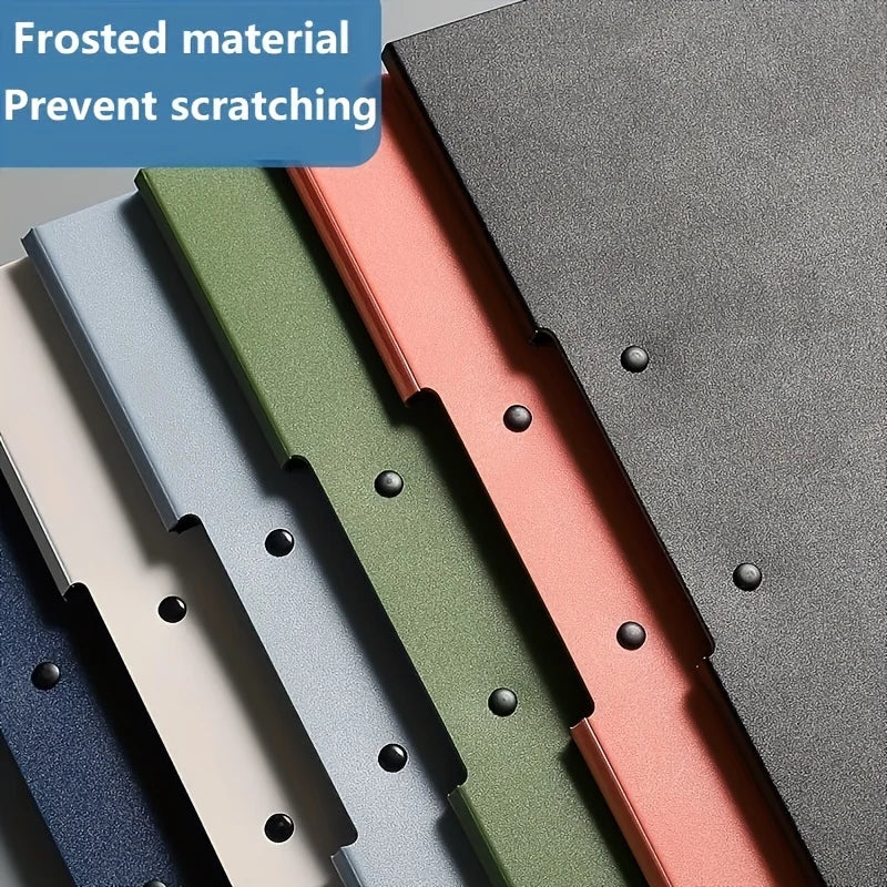 A stack of frosted material folders in various colors, including gray, green, pink, and dark blue.
