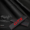 Black leather seat belt cover with GTS branding shown against a dark background.