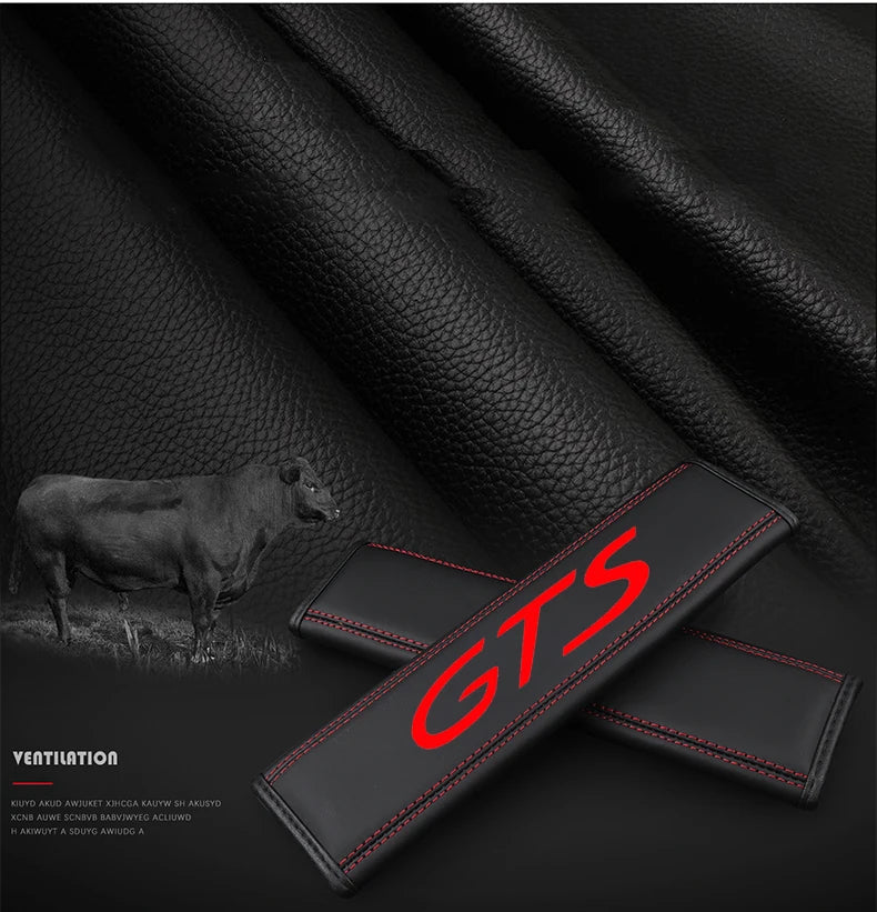 Black leather seat belt cover with GTS branding shown against a dark background.