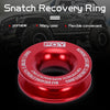 A red recovery ring is shown against a background of an off-road vehicle, highlighting its portability and flexibility.