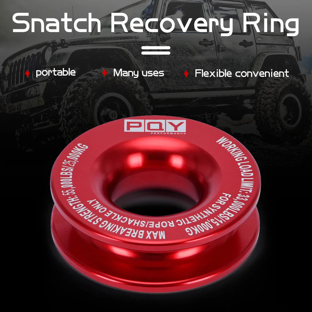 A red recovery ring is shown against a background of an off-road vehicle, highlighting its portability and flexibility.