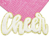 A gold glitter chenille letter patch spelling 'Cheer' on a pink cutting mat.