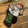 A playful cartoon carpet depicting a person in a white shirt and green pants.