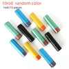 Ten rolled random color drawstring trash bags with handles displayed on a white background.