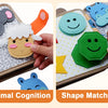A Montessori giraffe busy board featuring animal cognition and shape matching activities for toddlers.