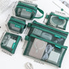 A set of six transparent mesh storage bags with zippers in various shades of green and gray, used for organizing coins, cards