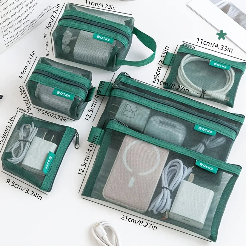 A set of six transparent mesh storage bags with zippers in various shades of green and gray, used for organizing coins, cards