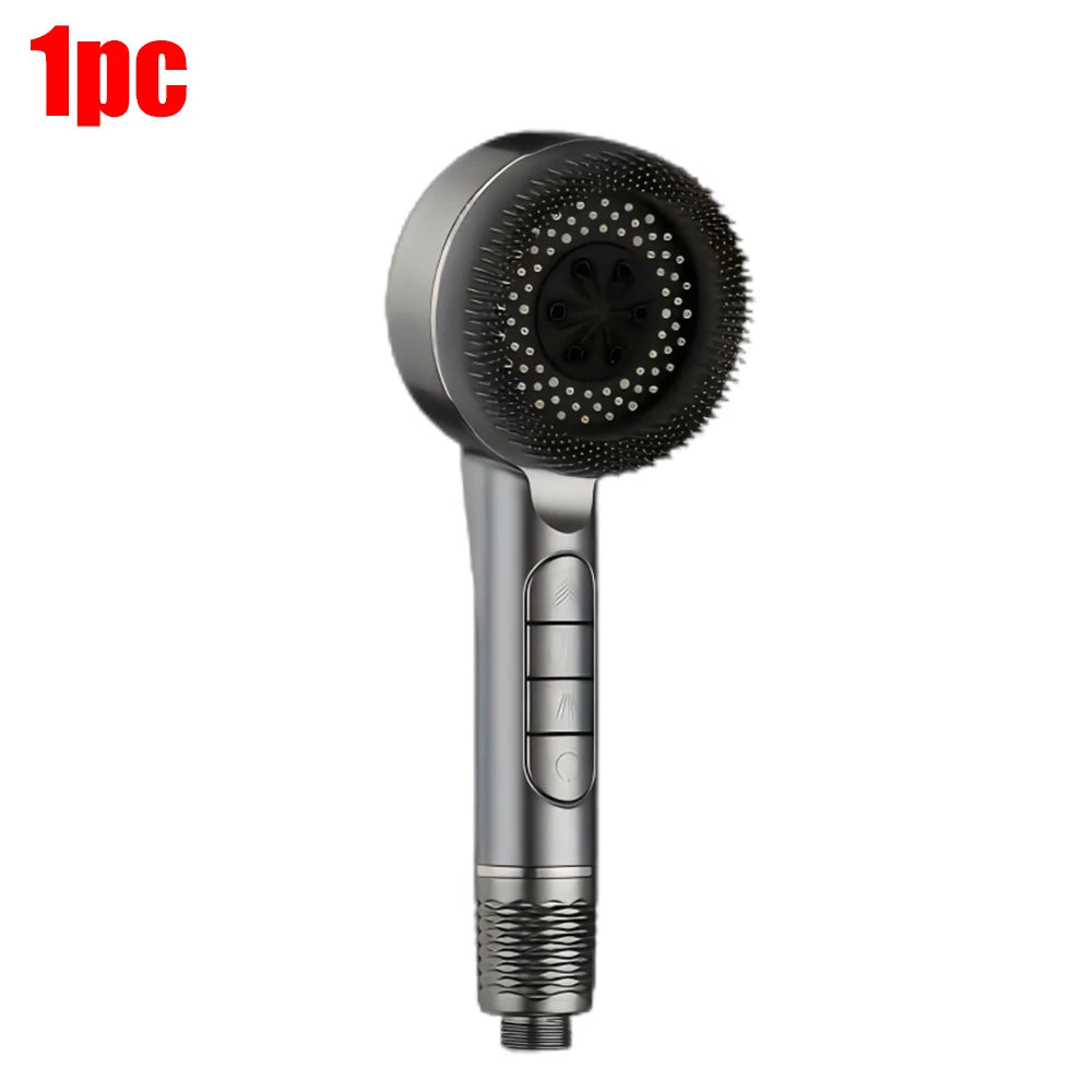 A silver handheld shower head with a textured silicone nozzle and a control button.
