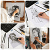 A collection of drawing tools including graphite and charcoal pencils, brushes, and a sketchbook used for creating sketches.
